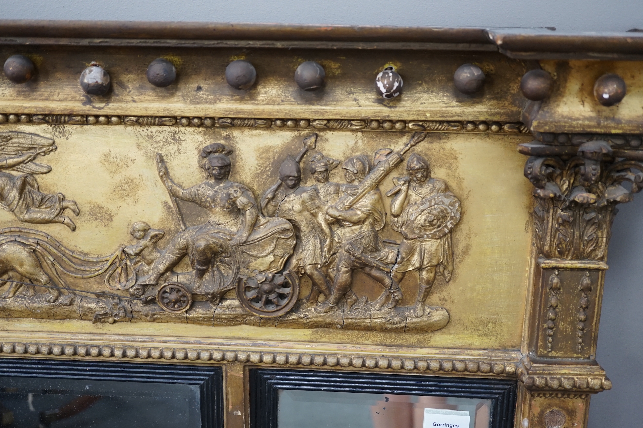 A 19th century neoclassical giltwood and composition overmantel mirror, width 140cm, height 98cm